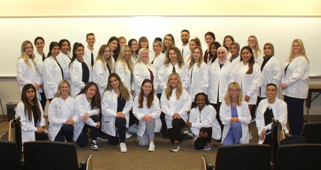 Future dentists and hygienists mark their entry into the profession at  White Coat Ceremonies — School of Dentistry